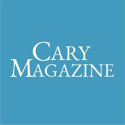Cary Magazine logo with white text on a blue background