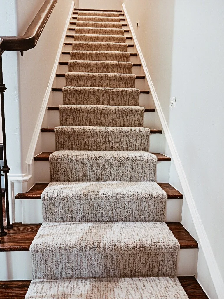 Custom Stair Carpet Runner – McKinney, TX
Installed a custom carpet runner over stained hardwood stair treads, adding warmth, comfort, and traction while preserving the beauty of the wood staircase.