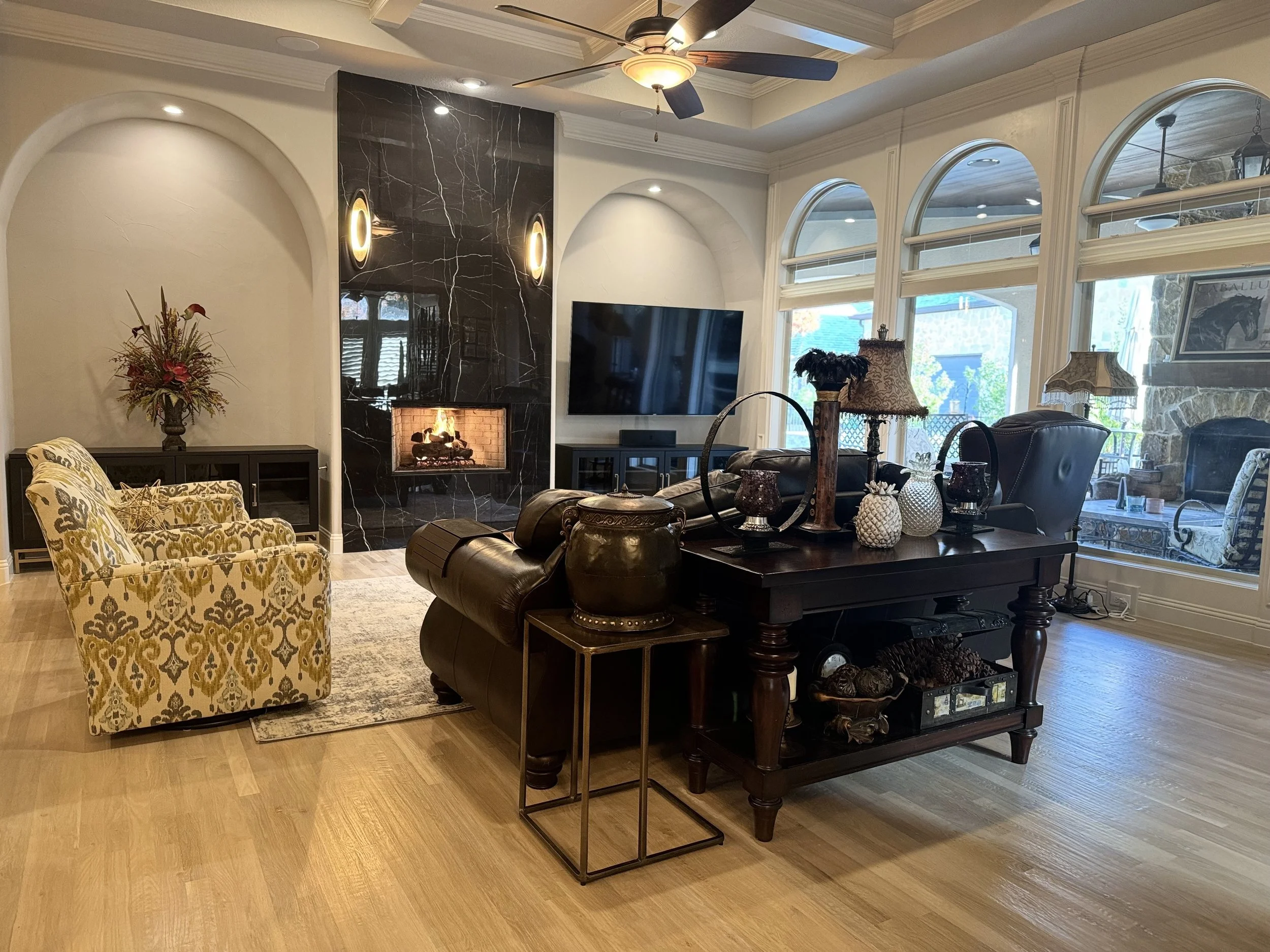 White Oak Hardwood Floor Refinish – McKinney, TX. Existing white oak floors refinished to a lighter natural tone to brighten the living space and highlight the home’s elegant architecture.