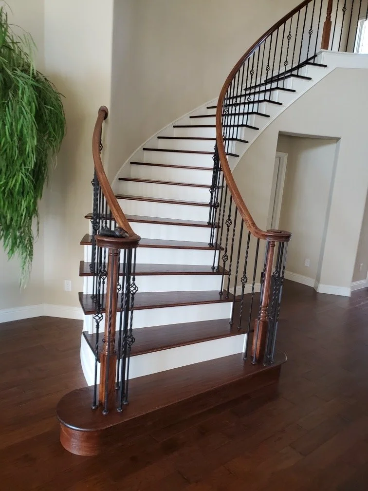 Custom Stair Remodel – Allen, TX
Converted carpeted stairs to elegant solid red oak treads, finished to match the existing hardwood floors. Decorative iron balusters and custom handrails were installed to create a timeless staircase feature.