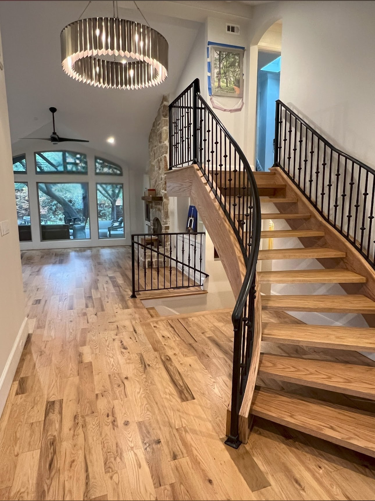 Hardwood Sand & Refinish – Richardson, TX
Existing dark hardwood floors and stairs were sanded and refinished to a lighter modern tone, revealing the wood’s natural grain and distinctive dark streaks that add character and uniqueness to the space.