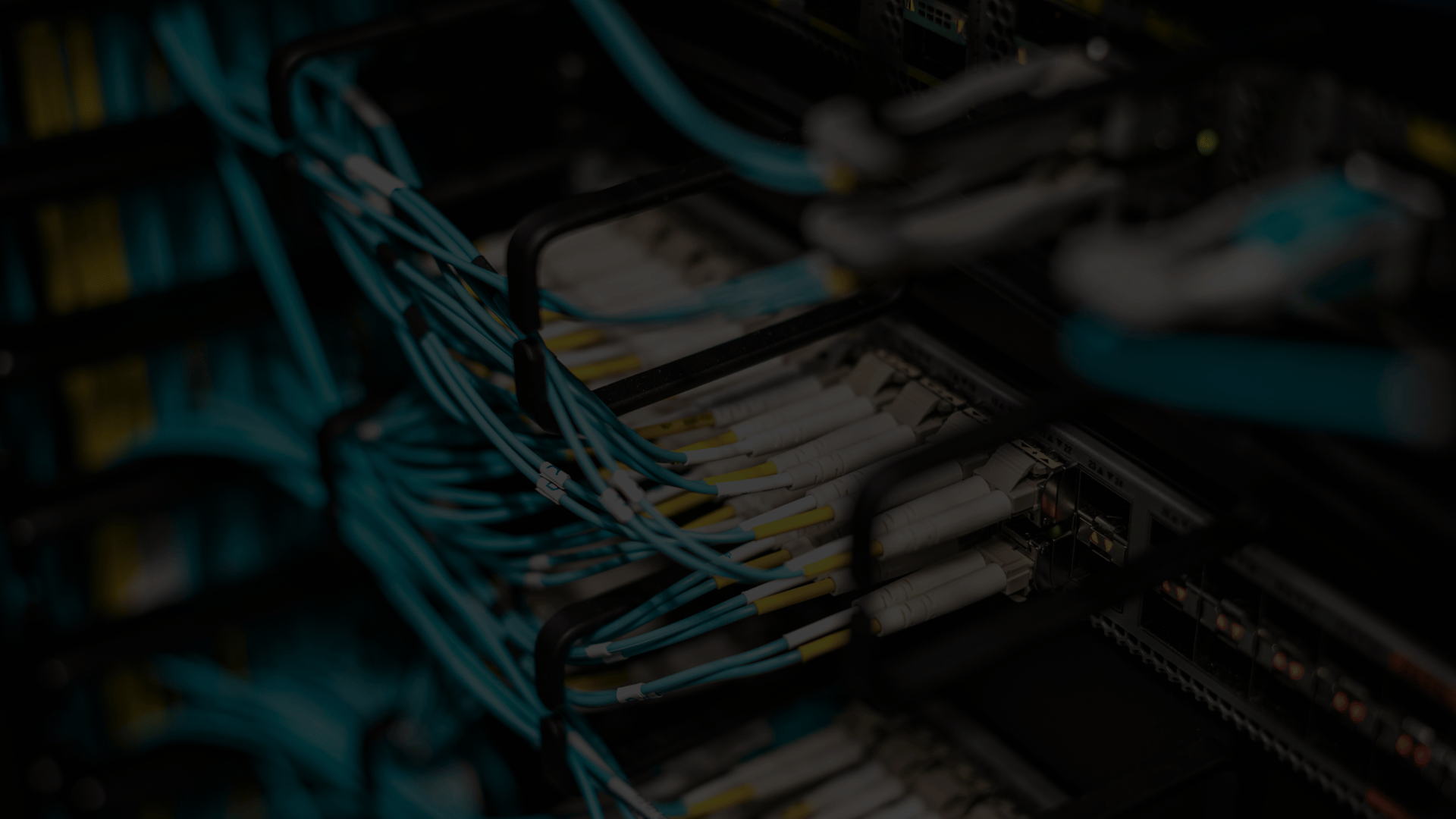 Server rack with connected network cables and switches.