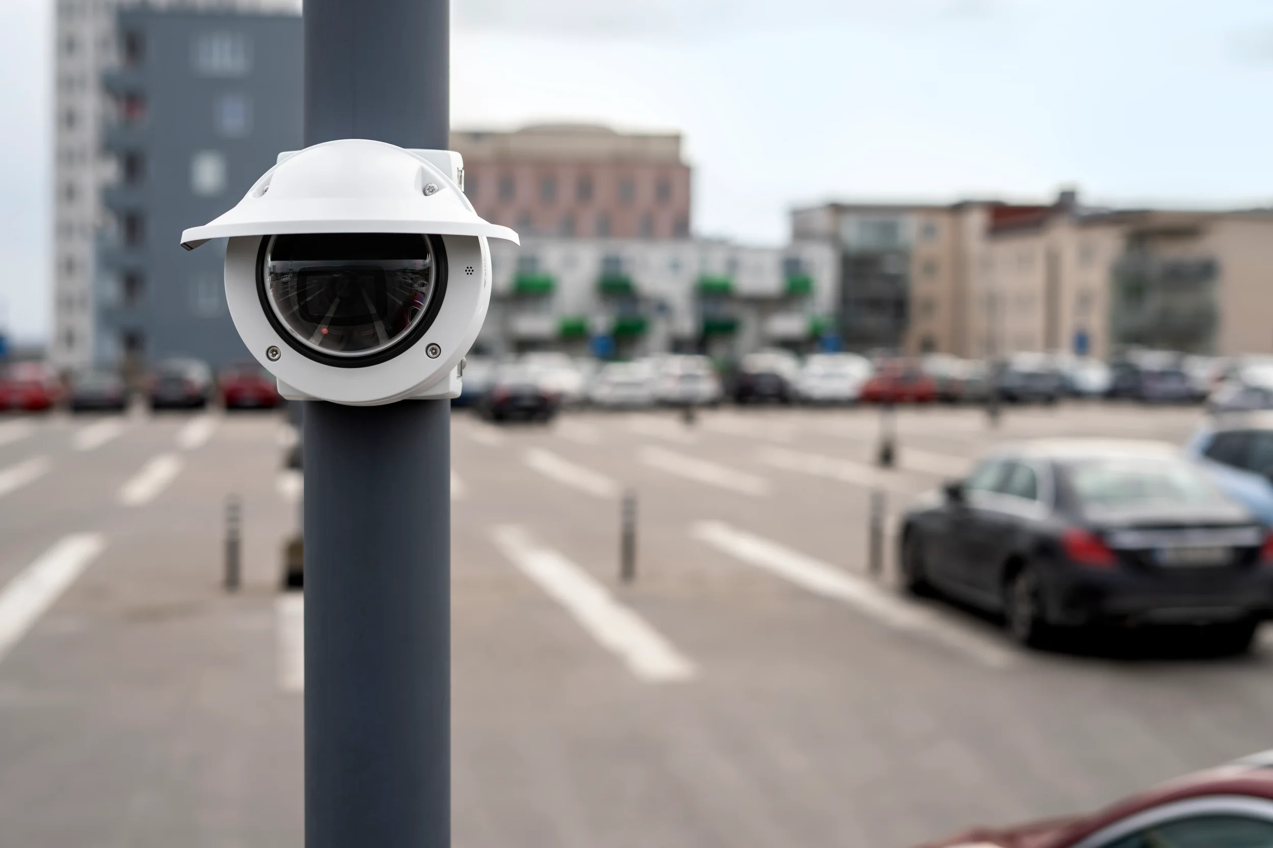 Outdoor dome CCTV security camera installed on street pole for traffic and public area surveillance