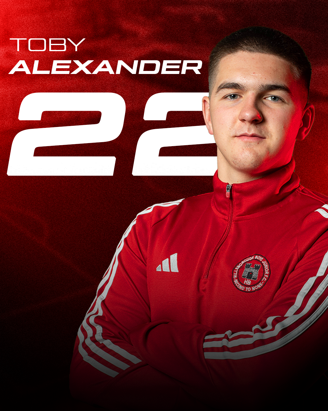 Young man in red sports jacket with white stripes on sleeves, standing with arms crossed, against a red background with text 'Toby Alexander 22'.