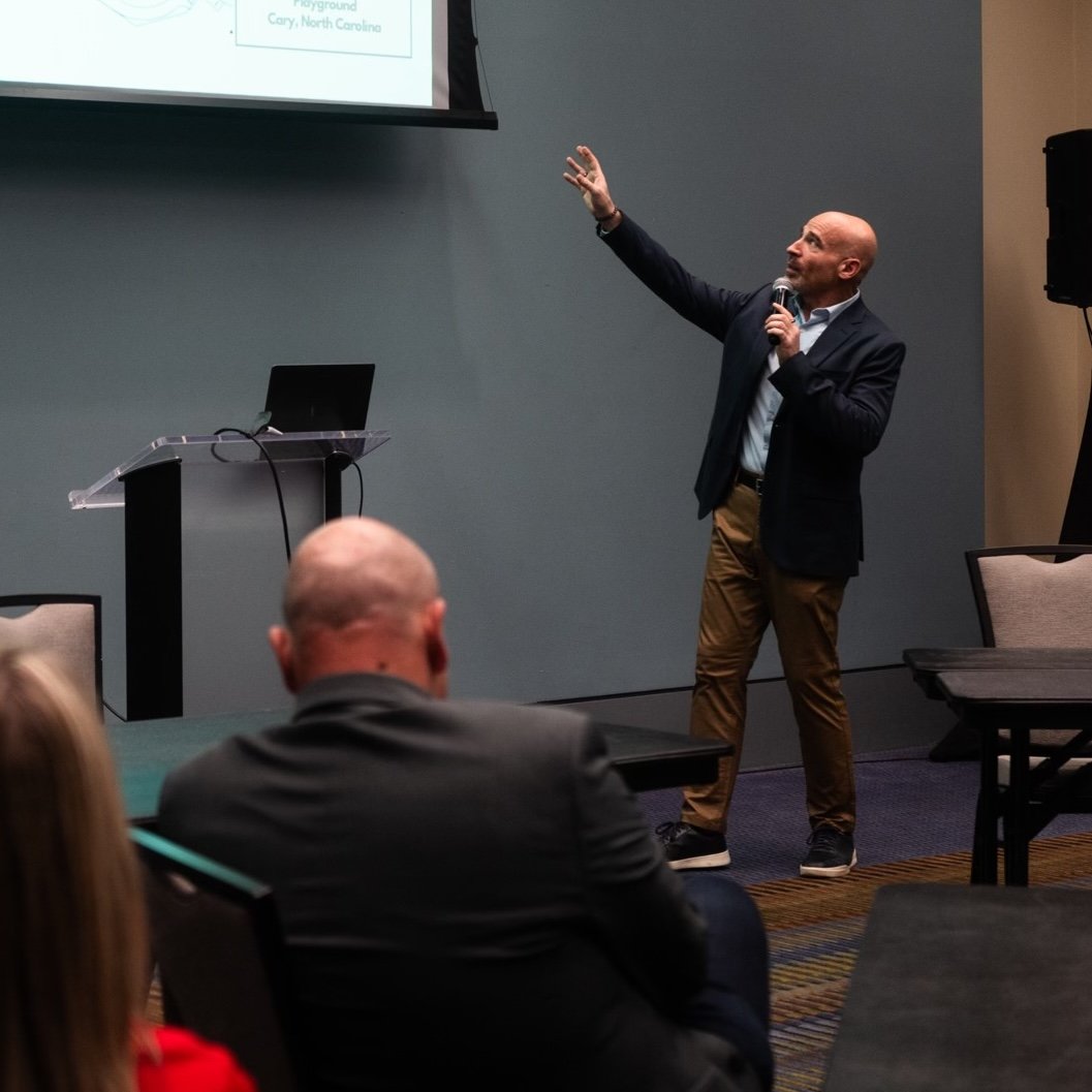 Kent Callison speaking at a conference session