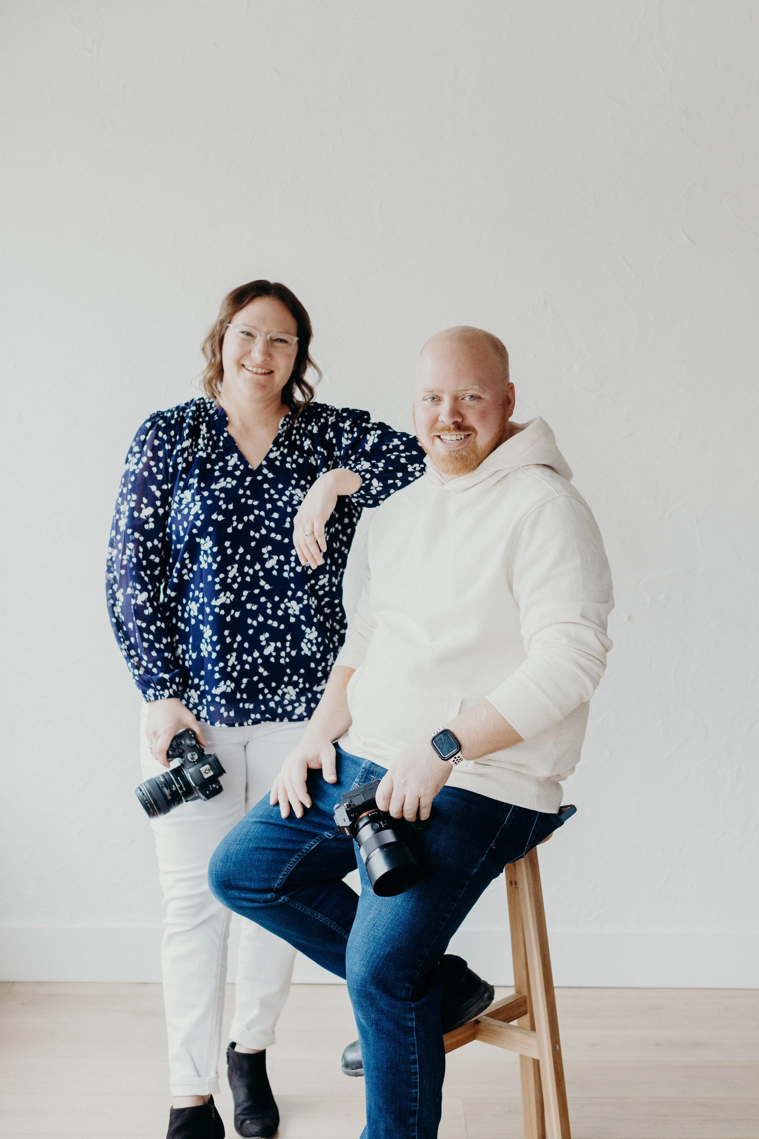 Stacy and Colton of NXT LVL Schools + Sports photography team serving Wausau Wisconsin schools and sports programs