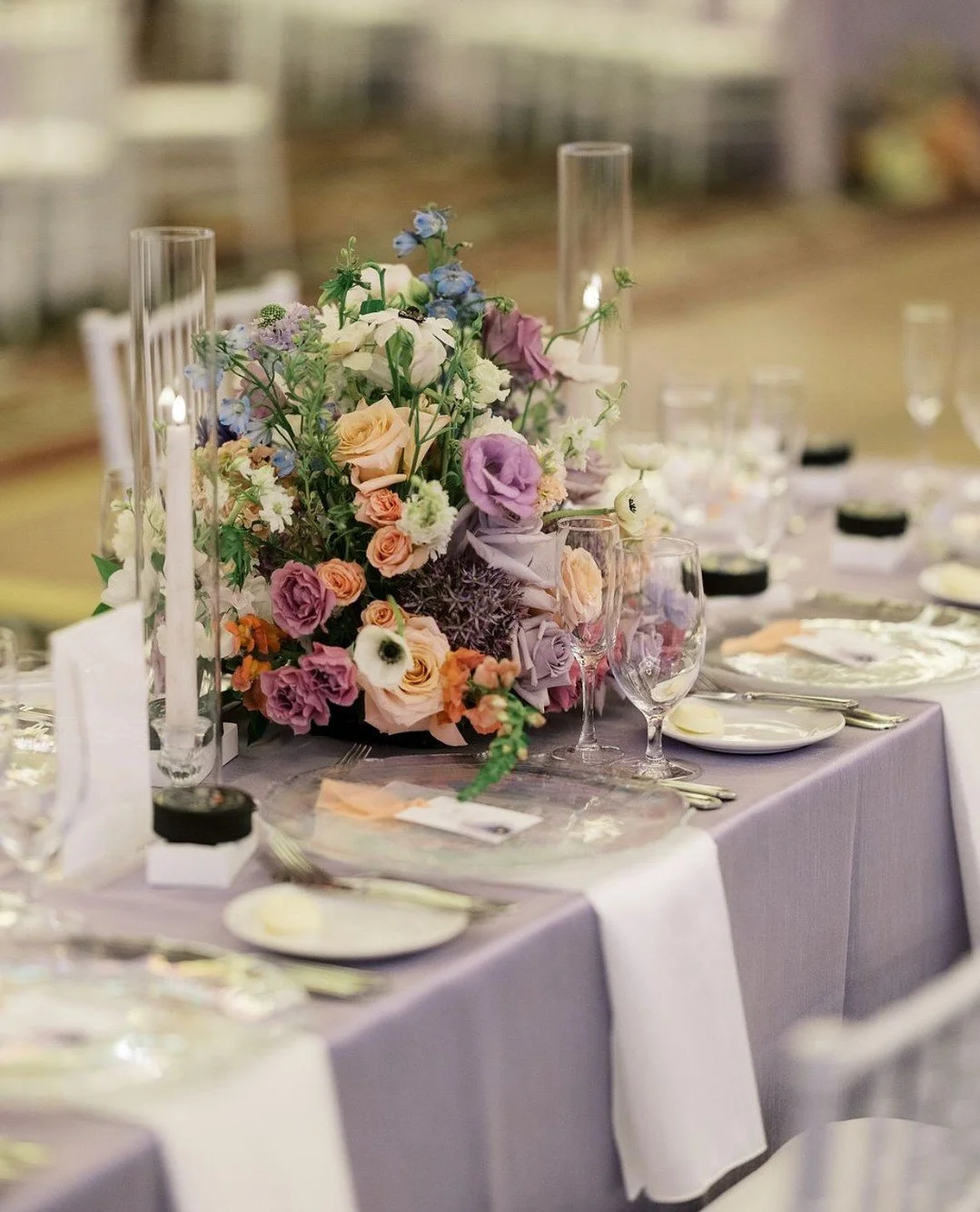 Oh hi... just some more colorful wedding inspiration for your feed today. ⁠It this is your vibe, you're our kind of people!💜💛🧡⁠
⁠
Planning &amp; Design: @sunrae.planning ⁠
Venue &amp; Catering: @gvrevents⁠
Photo: @amyadamsphotos⁠
Floral: @mylofleu