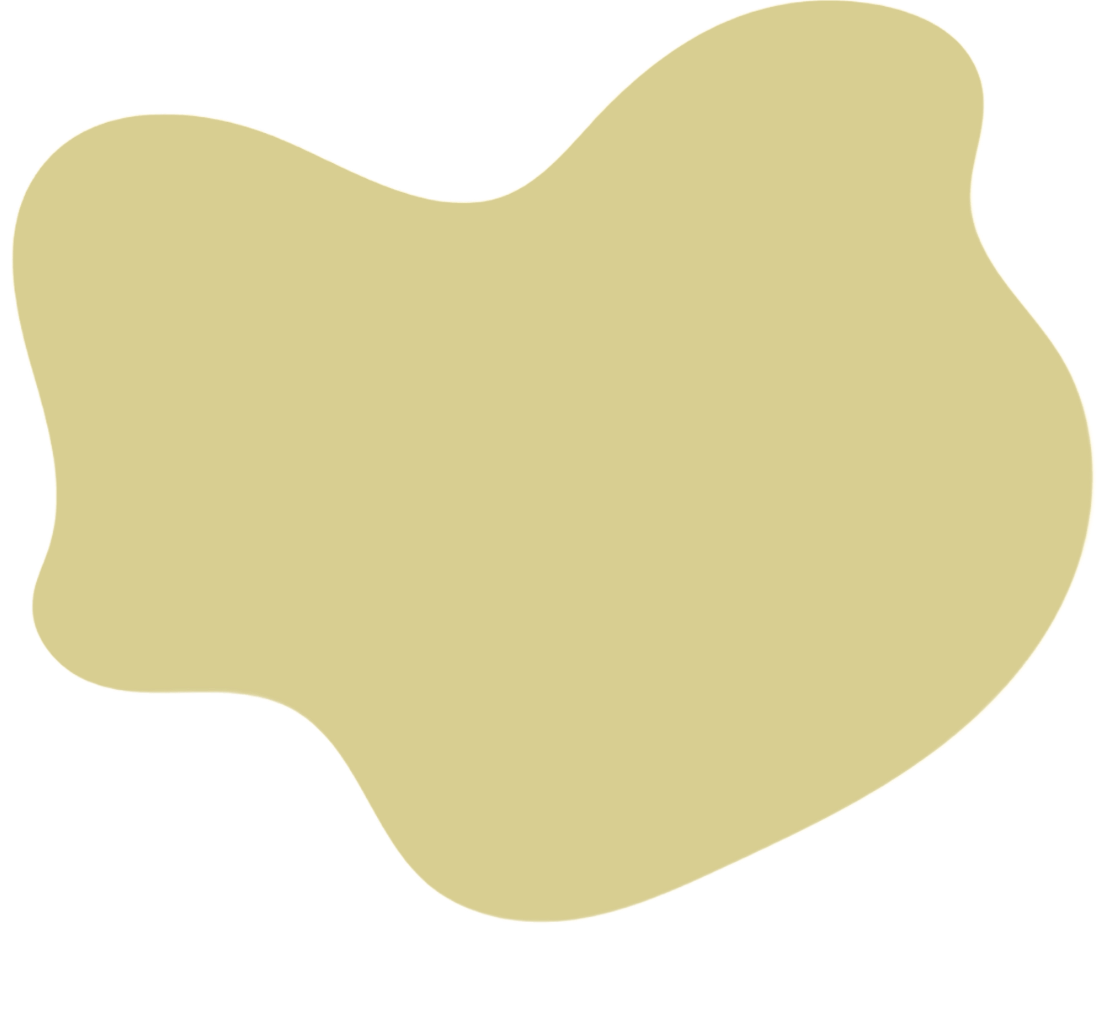 Abstract beige blob with irregular shape on a white background.