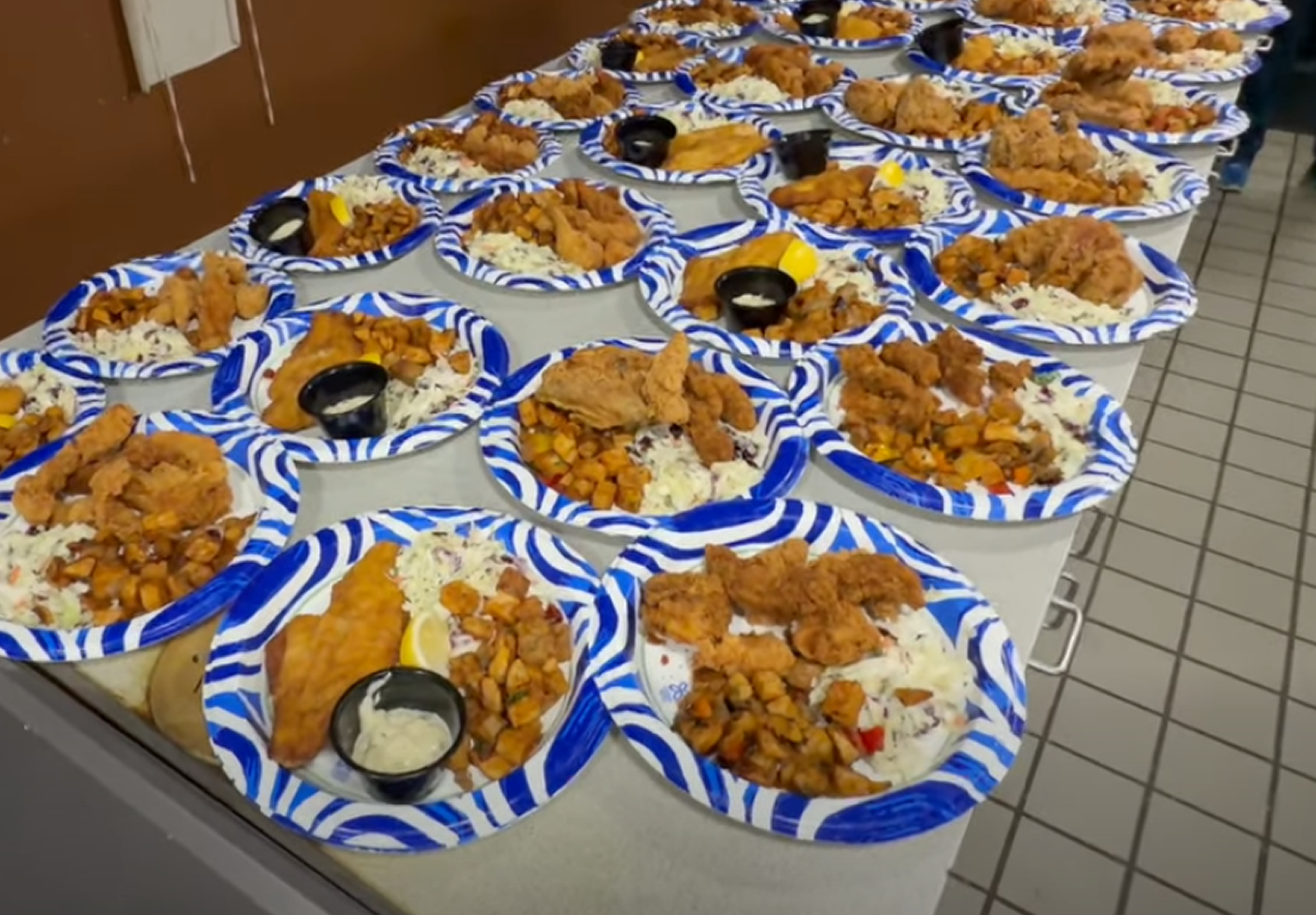 Plates piled with food for the homeless
