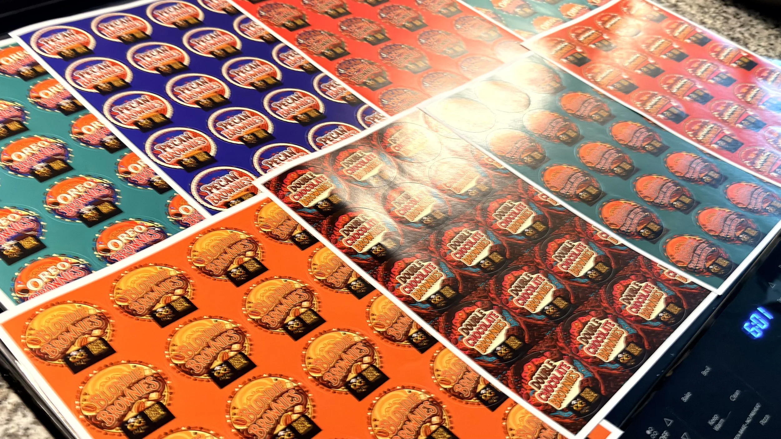 Sheets of Scratch-Off lottery tickets with various colorful designs and branding.