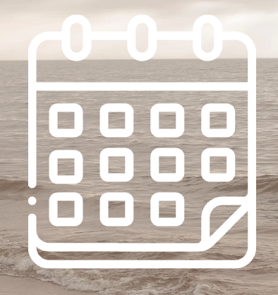 A calendar icon overlay on a beach scene with sand and ocean waves.