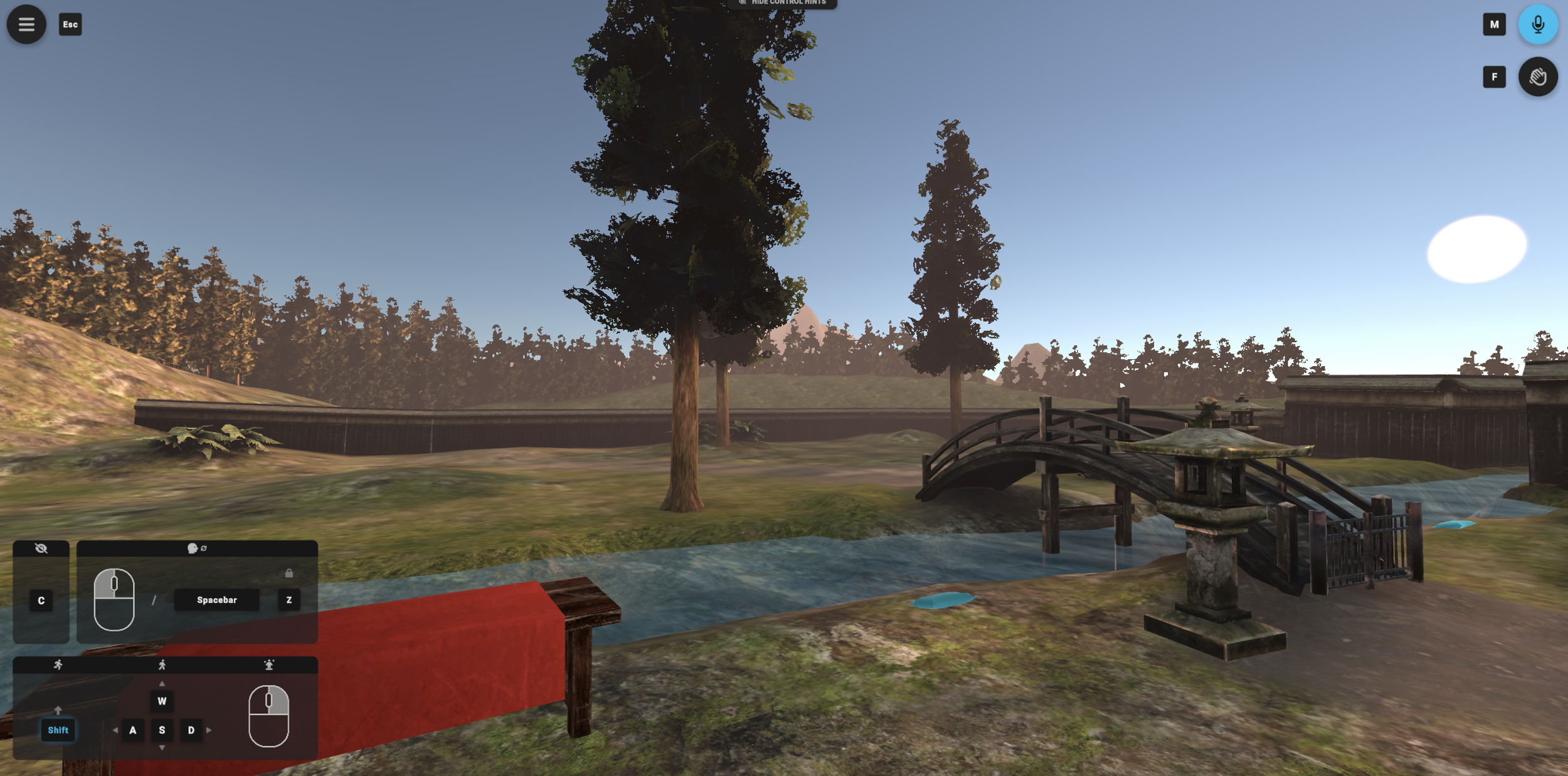 Stream, arched bridge, trees, and outdoor seating in the ENGAGE XR Japanese garden.