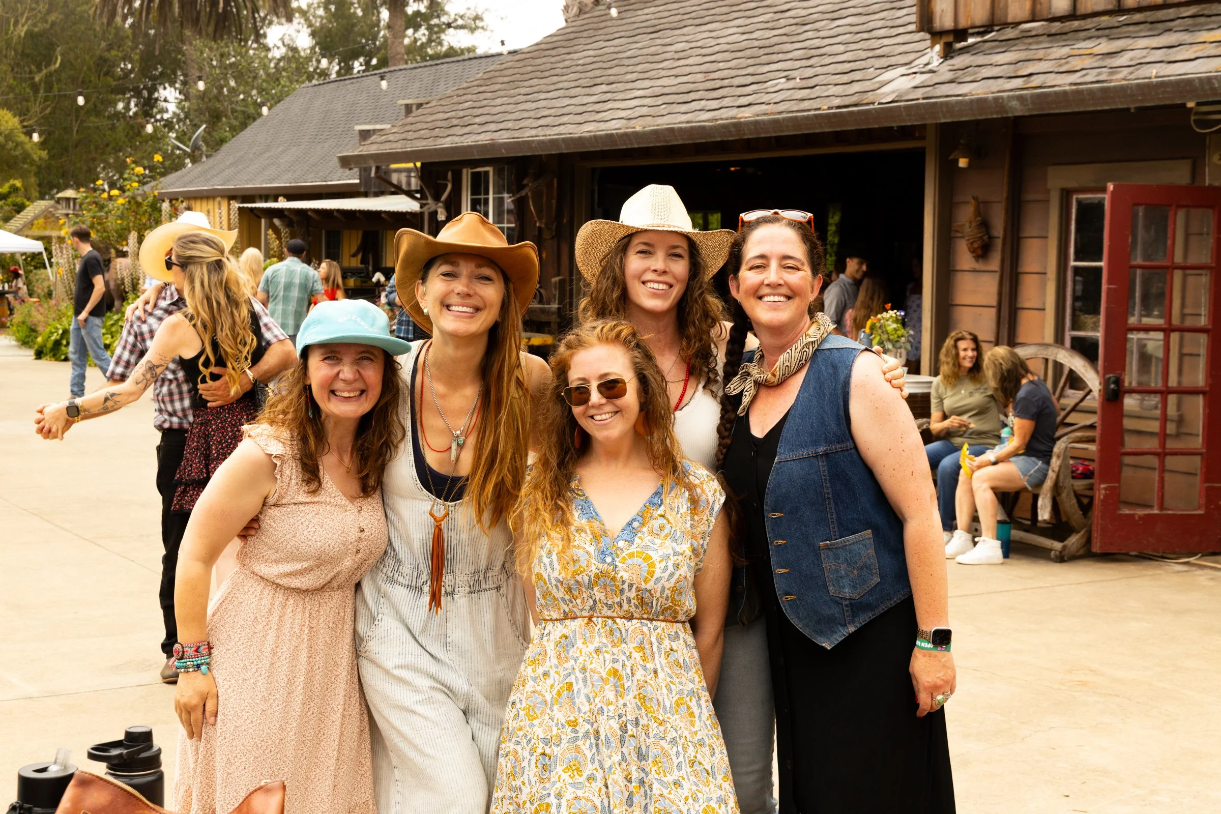 Country Dance Day in Half Moon Bay Event. Happens every August at Long Branch Saloon & Farms. Featuring all day line dancing and couples dancing instruction with Line dancing Lisa and DJ Shivers. 6 woman smiling and posing for a photo at the event.