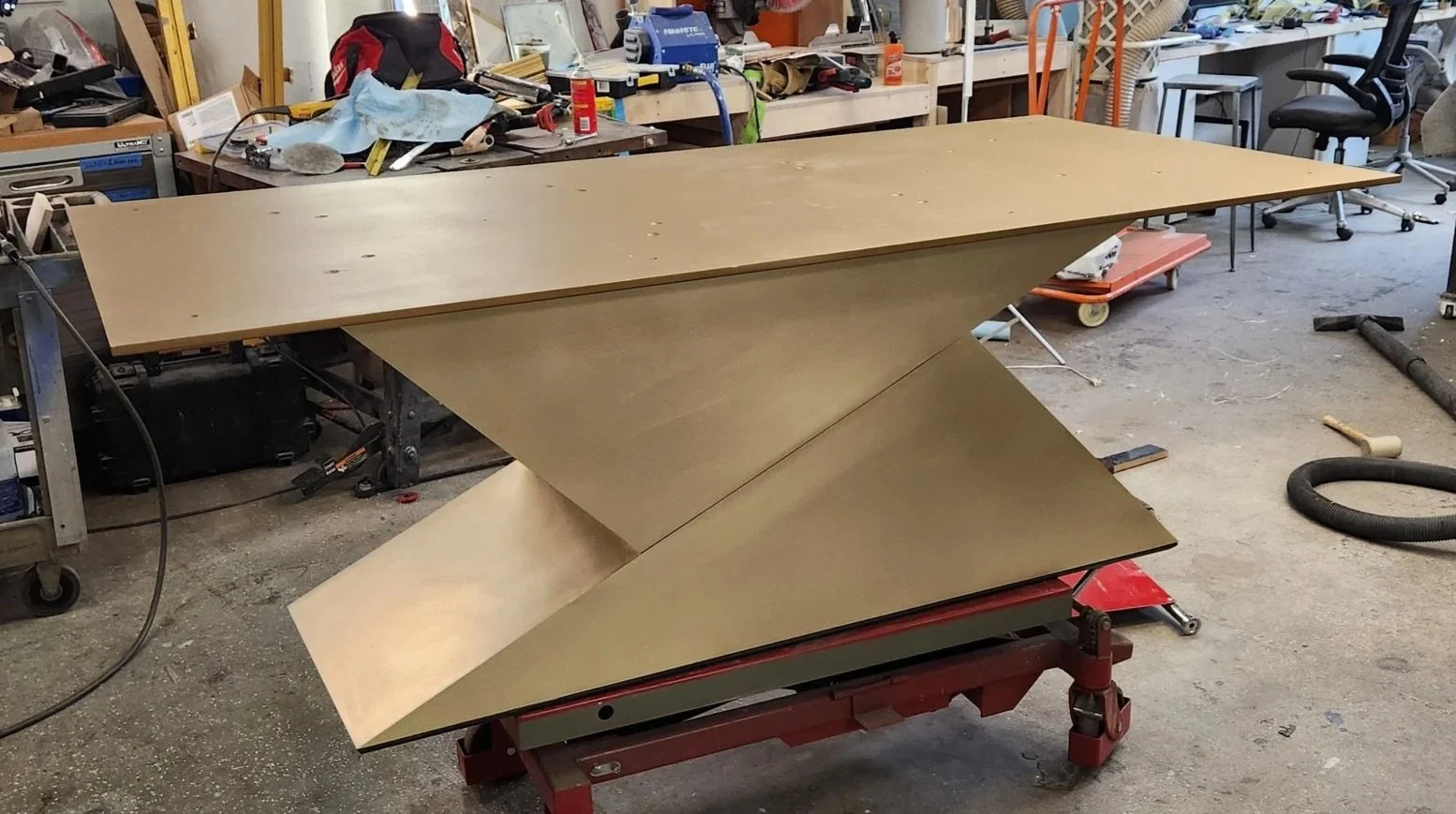 Monolithic Bronze Triangular Table Base