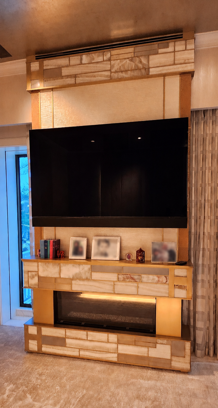 Bronze and Onyx Cladded Fireplace - 2025