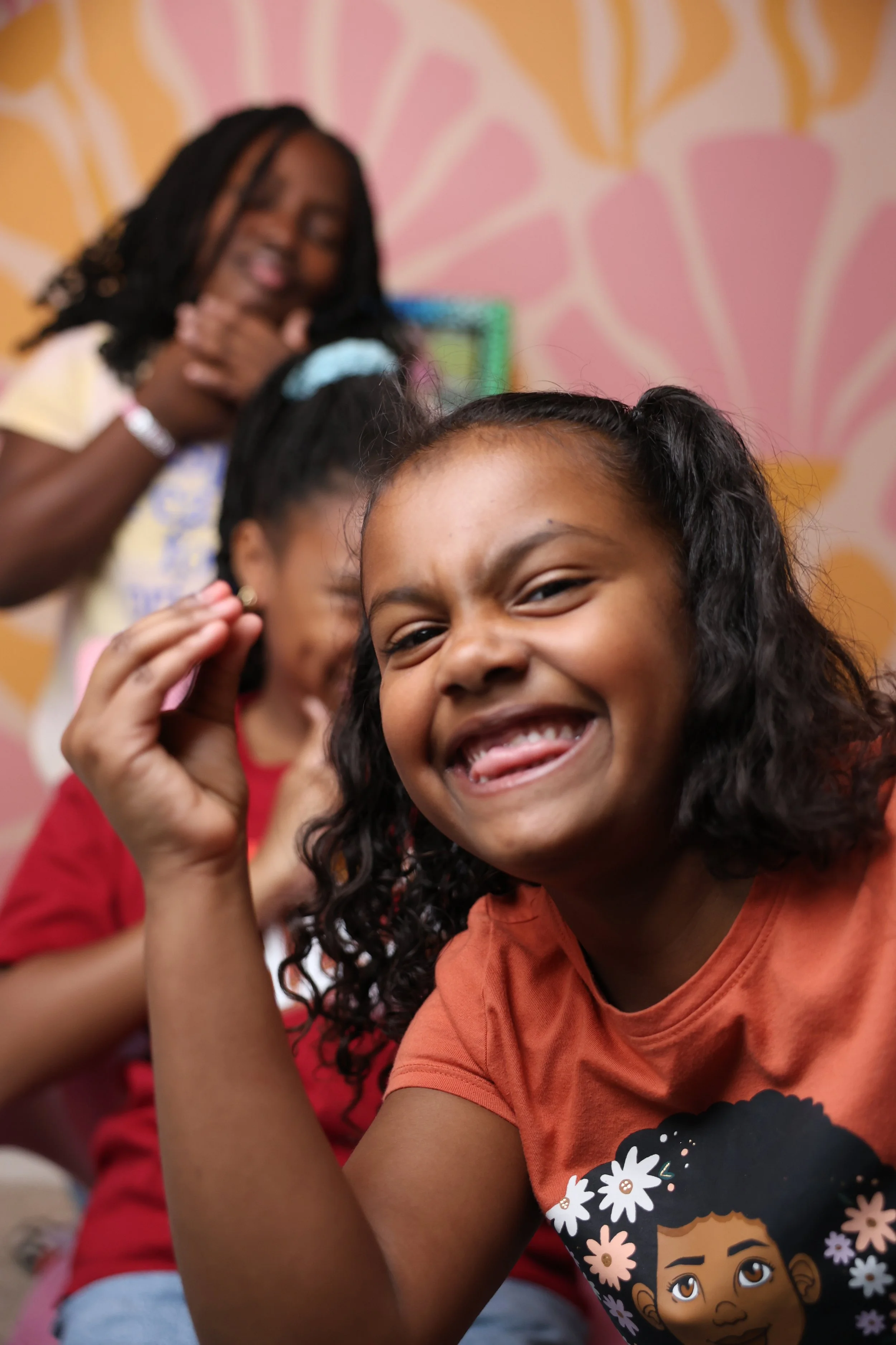 Three girls enjoying hands-on craft activities