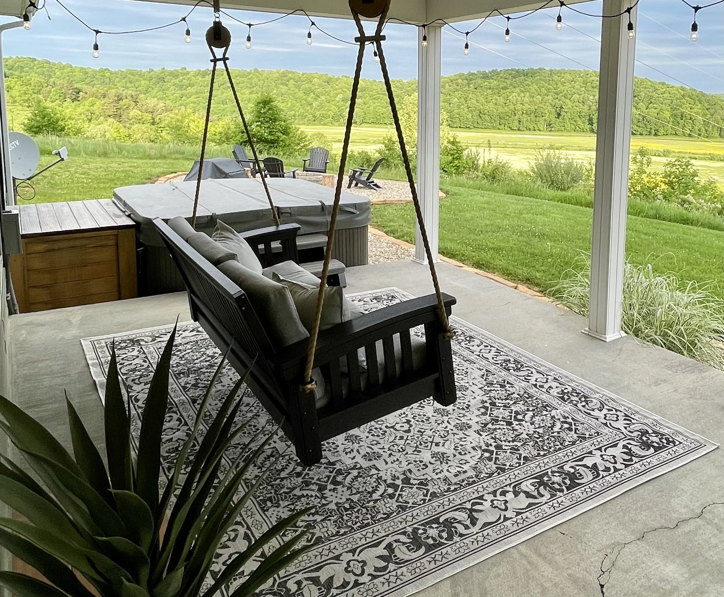 Porch swing hot tub bbq grill and fire pit