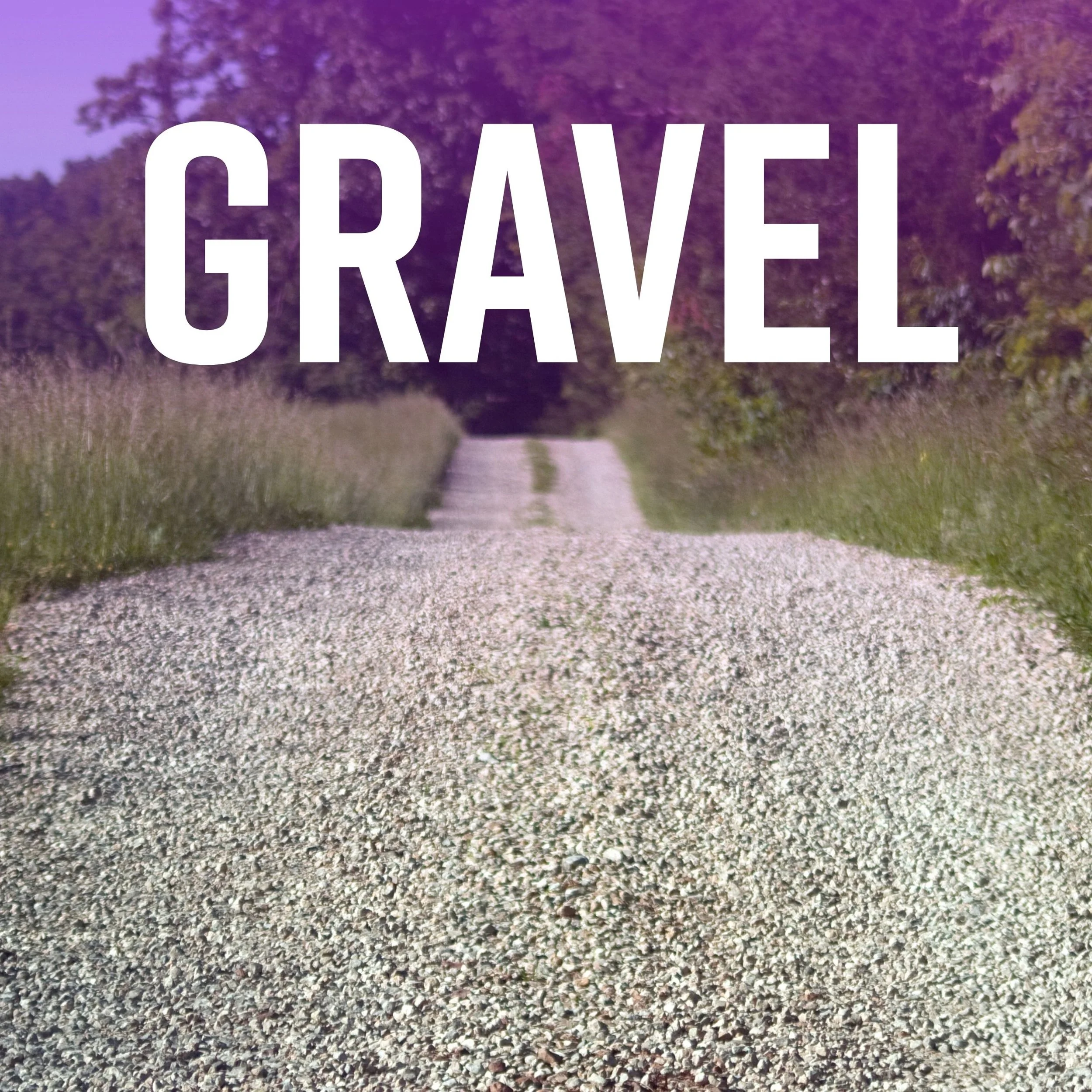 A gravel pathway surrounded by grass and trees with purple leaves, and with the word 'GRAVEL' written in large white letters overlaying the image.