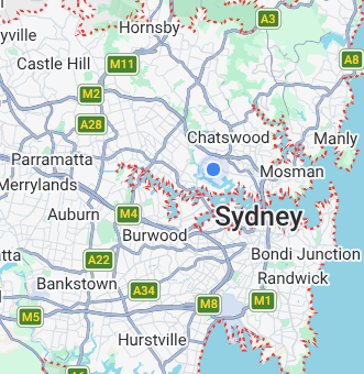 Map of Sydney, Australia and surrounding suburbs showing major roads and highways like M1, M2, M4, and M8, with labels for areas like Chatswood, Manly, Parramatta, and Auburn.