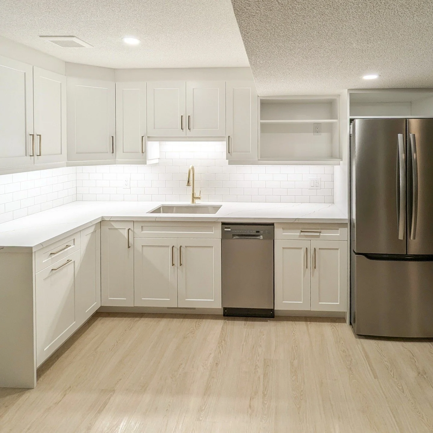 Stoneycreek Basement Apartment Before, During &amp; After.

This project was a full basement transformation - from an underused space to a fully finished apartment.

We took it back to framing, reworked the layout, and built it back up with a focus o