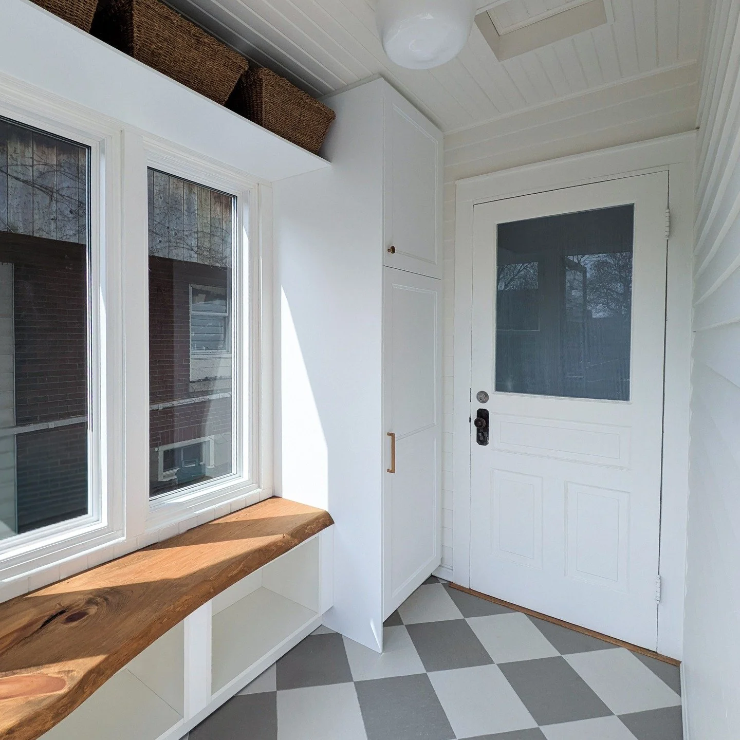 Beamsville Mudroom Before &amp; After.

This mudroom was ready for a major refresh in both function and feel.

We introduced integrated storage while working with the home's existing character to maintain its classic charm. Creating a space that feel