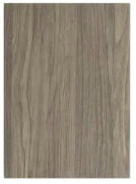 A close-up of a light wood surface with visible grain patterns.