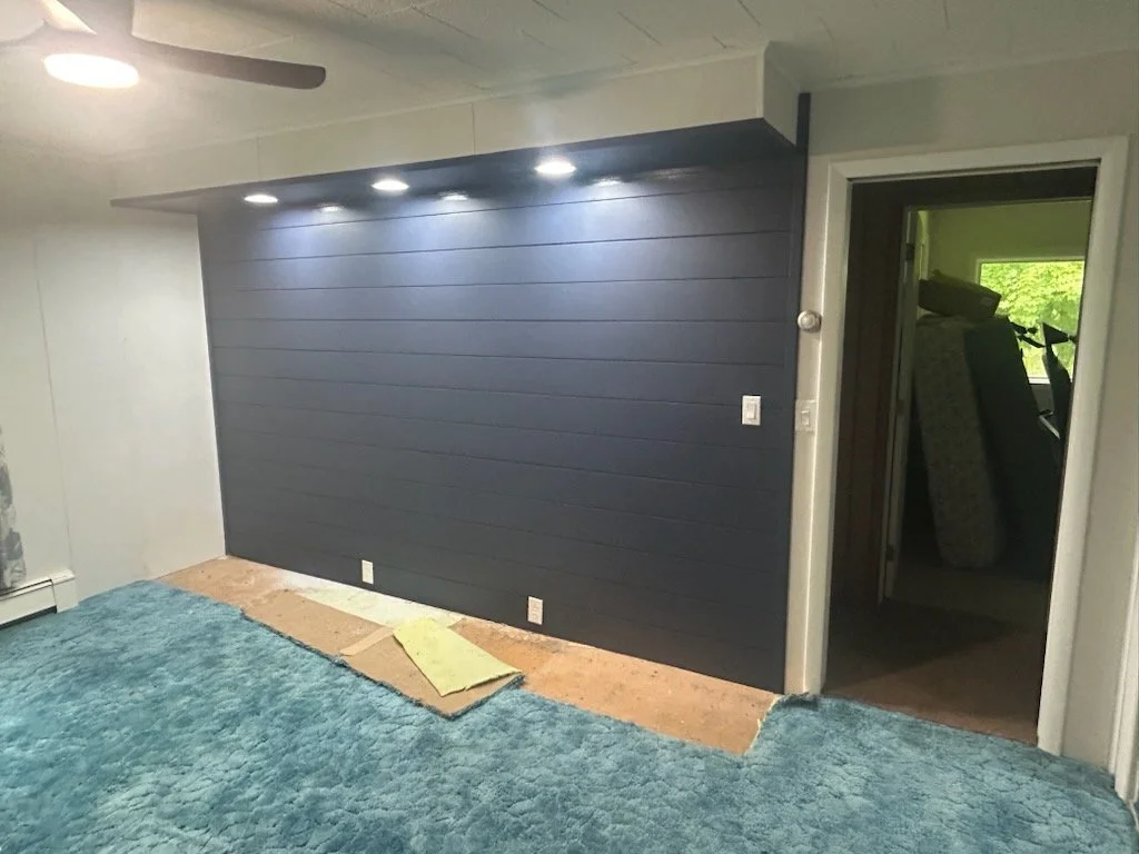 A simple accent wall can completely change the flow of a room.