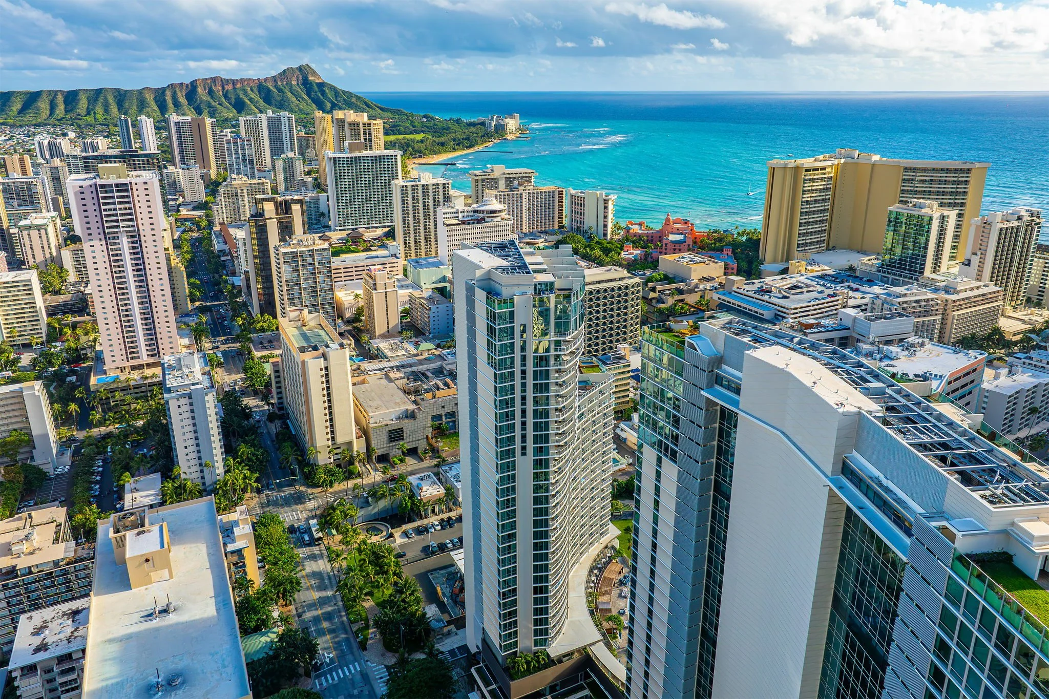 Aerial view of Waikiki condo towers with Diamond Head and the ocean in Honolulu, Oahu