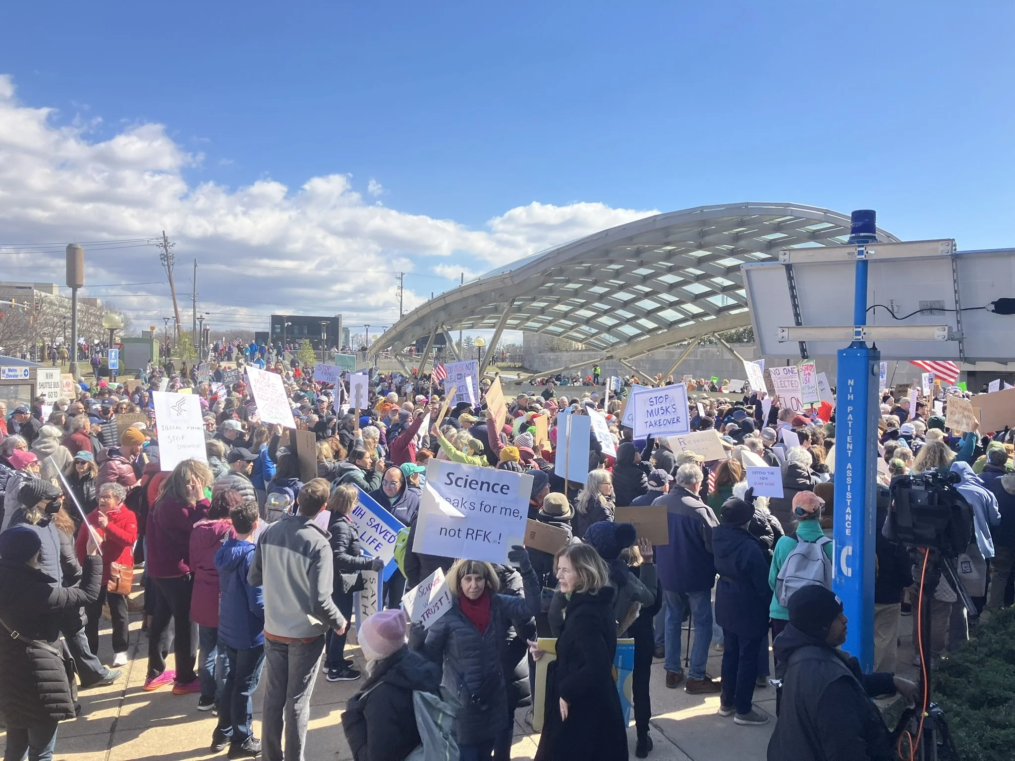 Crowd at MCDCC rally protesting cuts to NIH funding at NIH headquarters in Rockville, MD