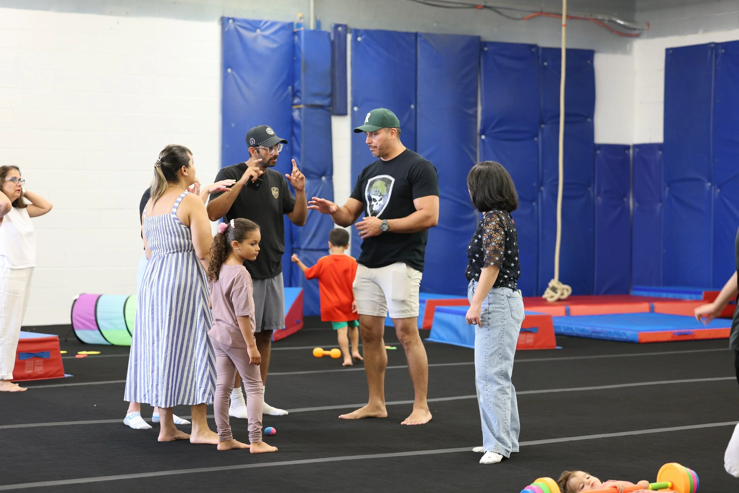 Families visiting Elite Gymnastics Academy during Opening Day in Oakville, Ontario