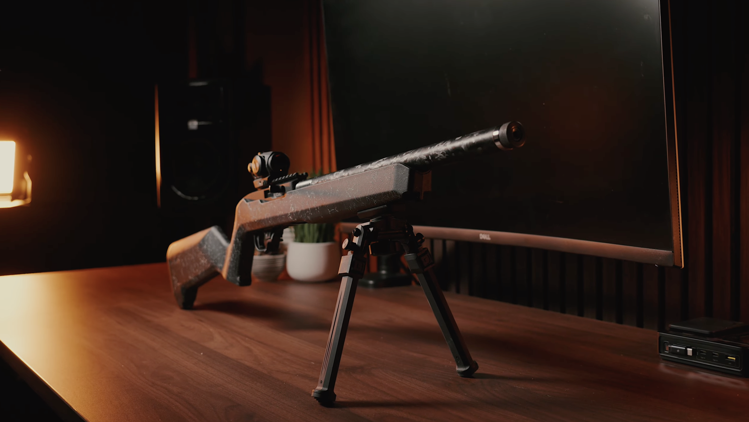 Ruger 10/22 with threaded carbon fiber barrel, CVLife bipod, and Cyelee red dot.