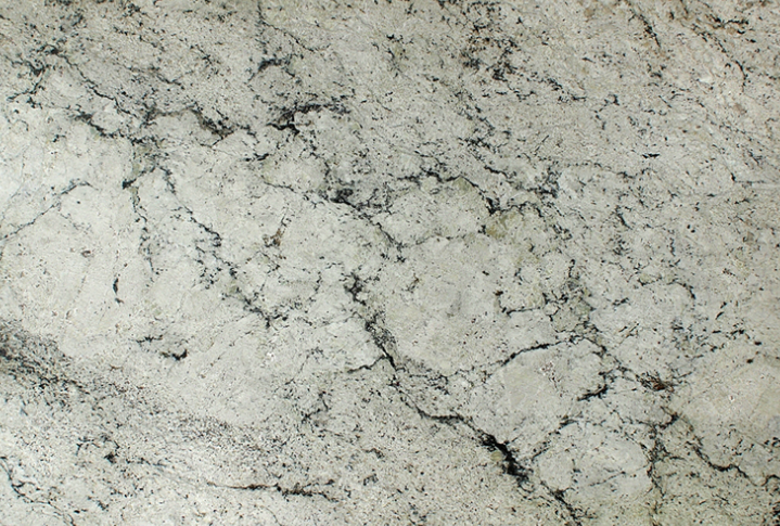Superficie de piedra o granito con grietas y textura rugosa
