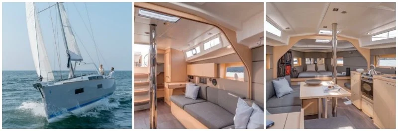 A sailing boat on the water, interior of a boat with a seating area and a dining table inside the boat.