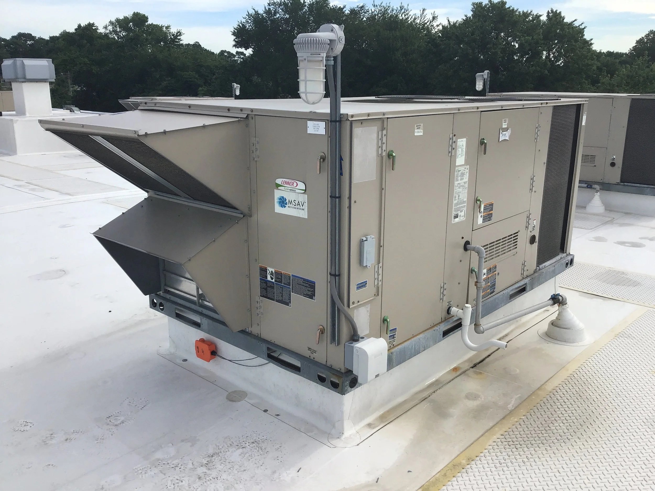 Commercial rooftop HVAC unit used for load calculations and equipment selection in light commercial mechanical design.