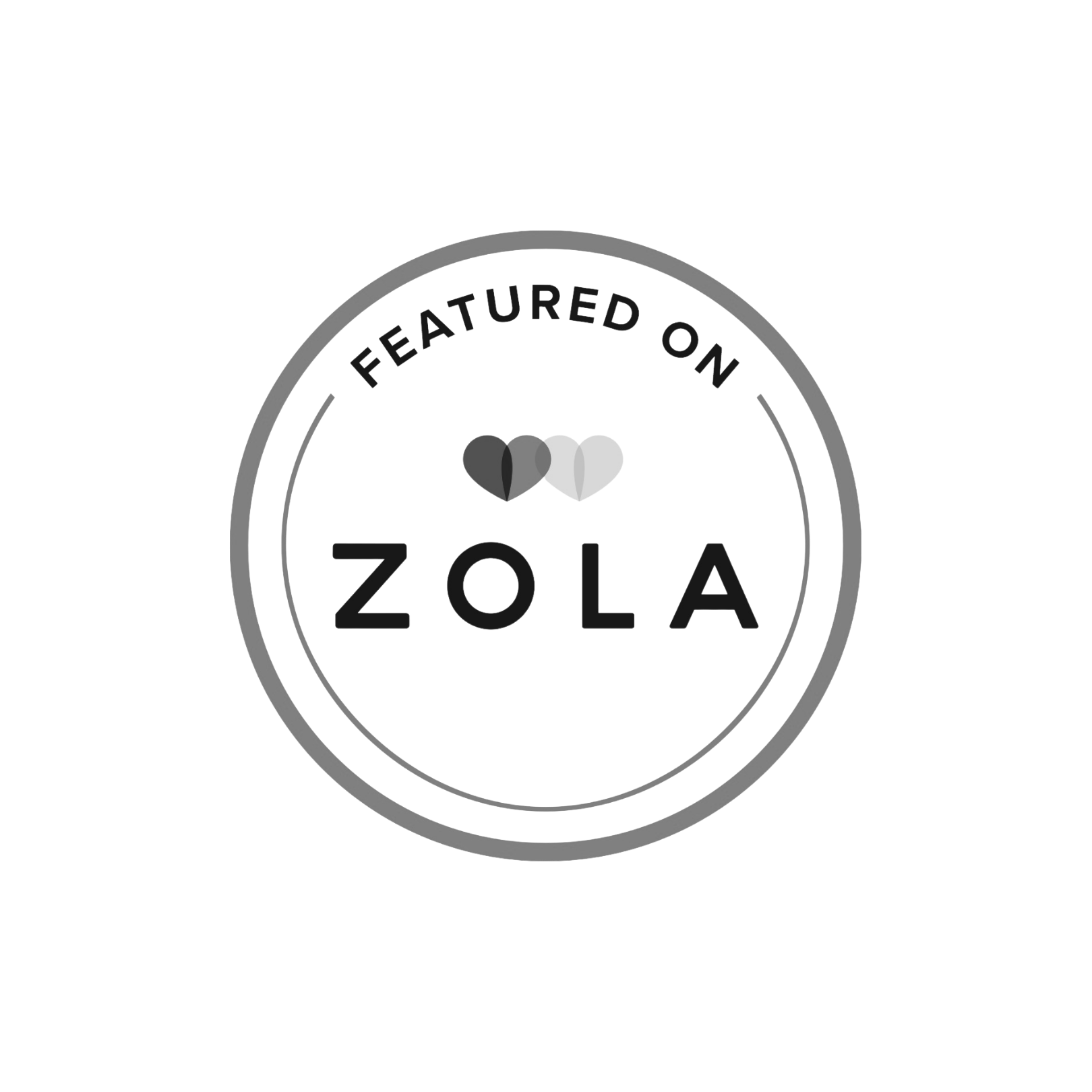 Zola logo with hearts and the text 'Featured on Zola' in a circular design