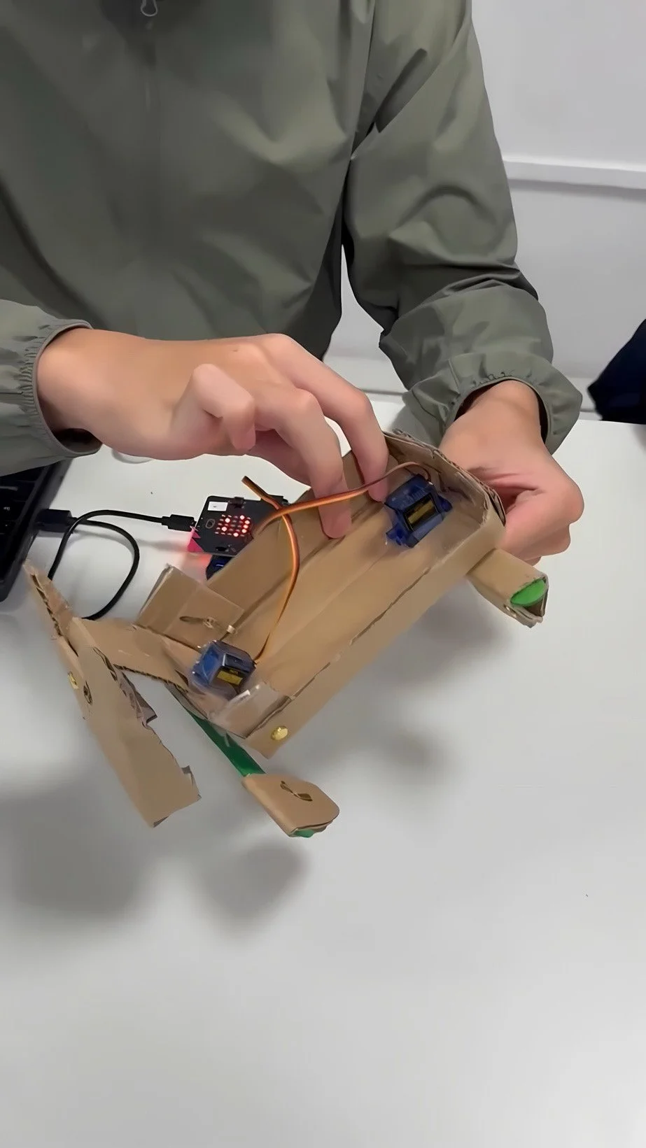 Children building engineering prototypes during a hands-on STEM birthday party activity