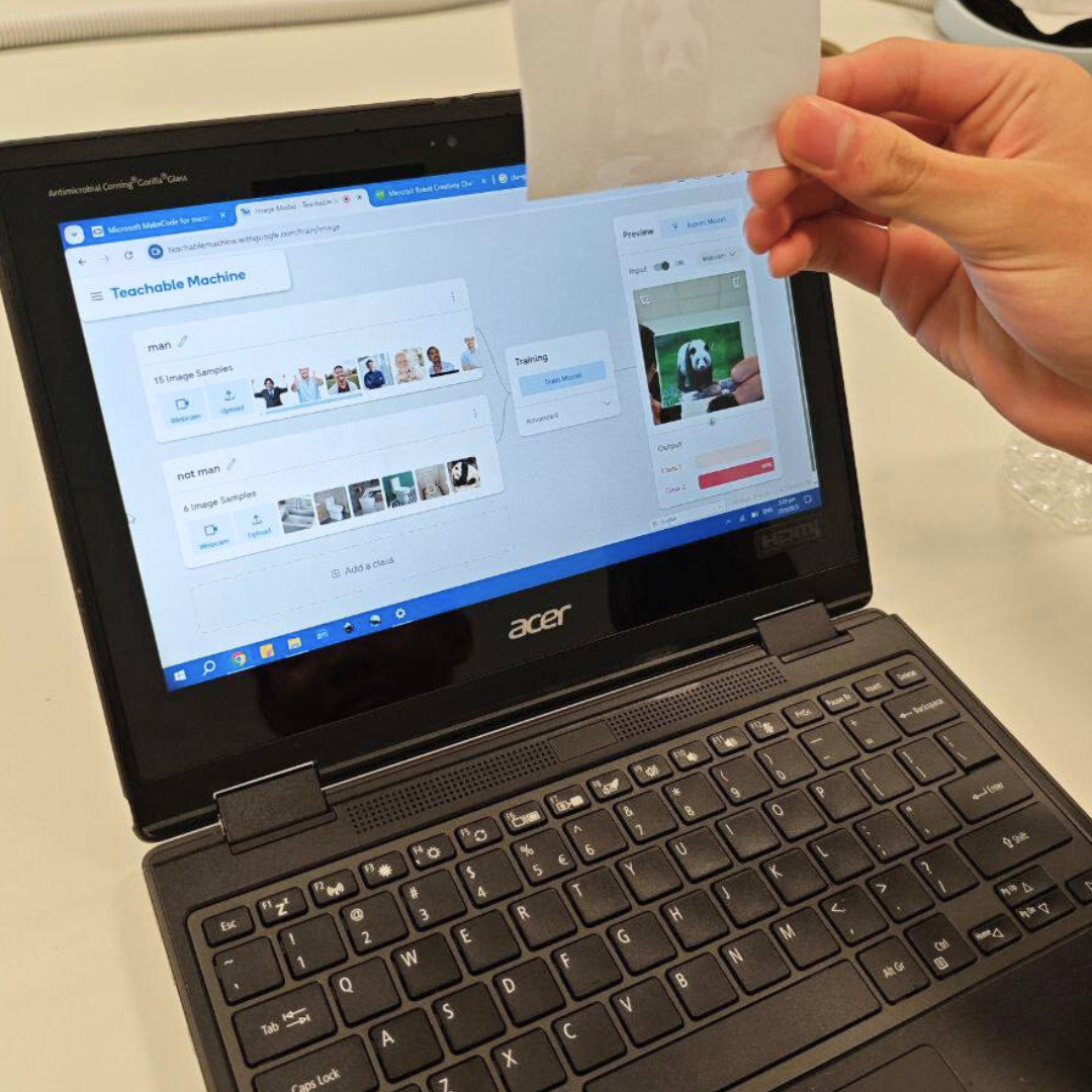 Students learning about artificial intelligence and digital technology during a digital literacy workshop