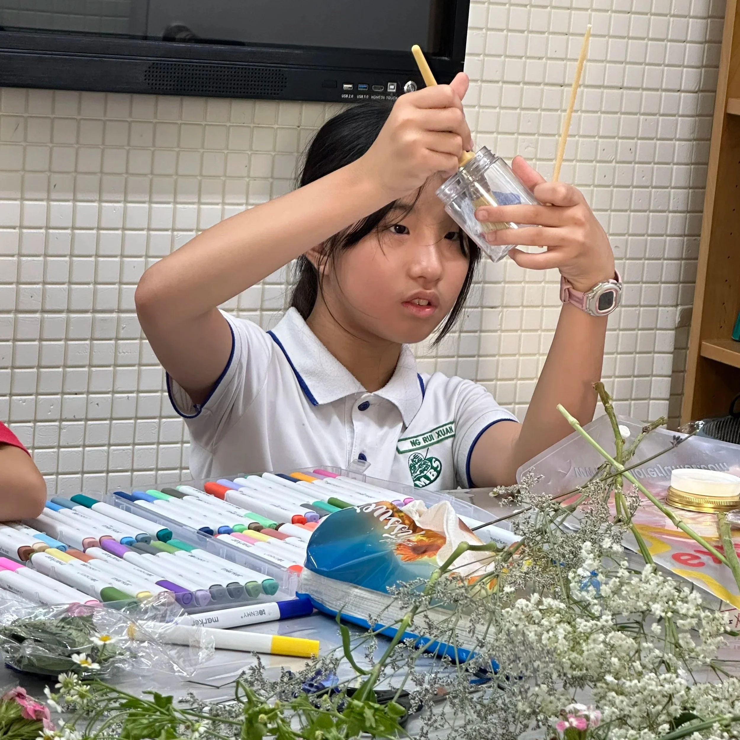 Children developing and testing a Community STEM project with Explorer Junior in Singapore