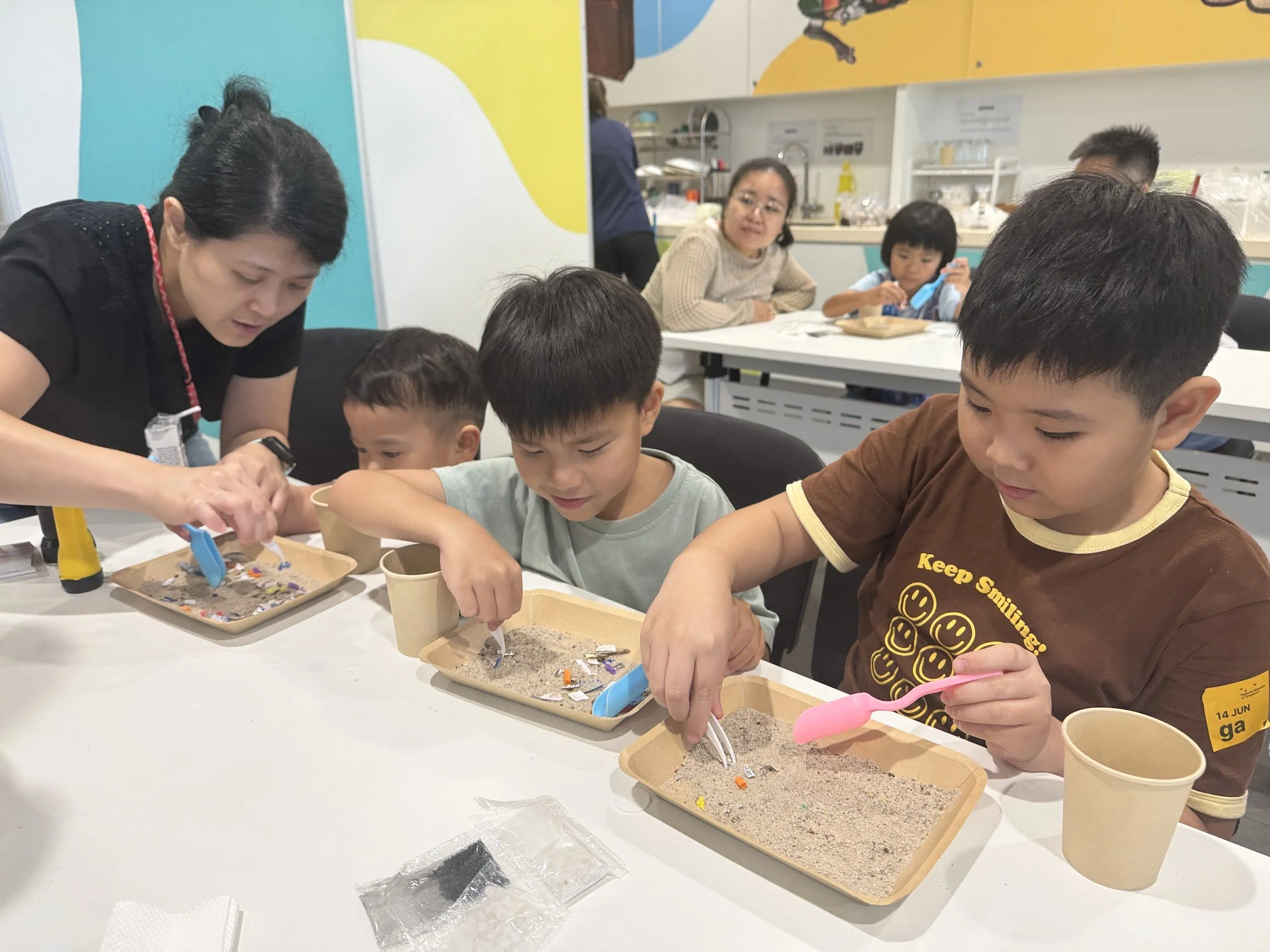 Mother_helping_children_with_STEM_Acitivity
