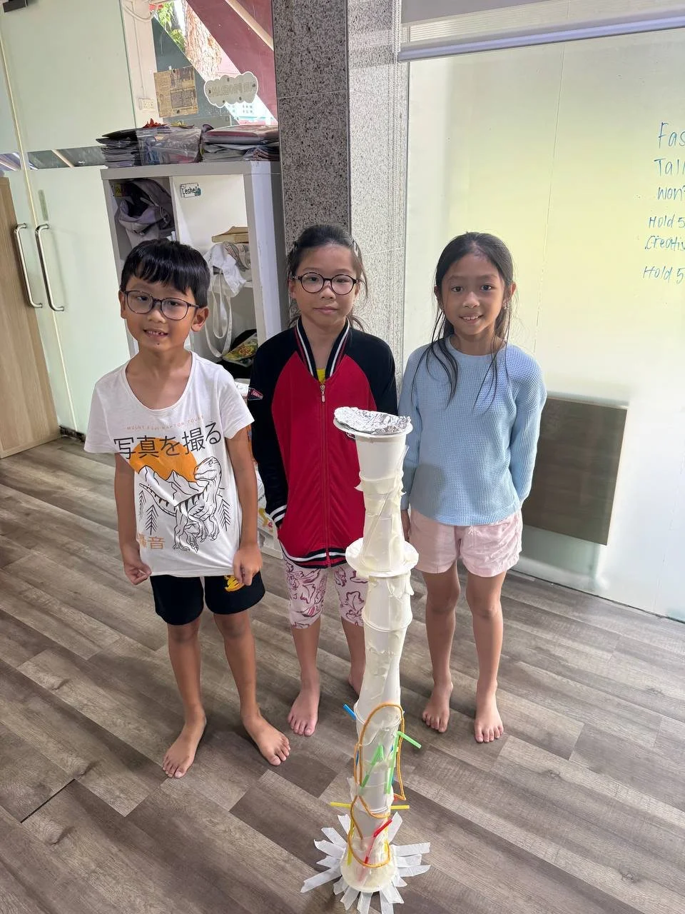 Students collaborating on engineering projects during Explorer Junior afterschool learning time