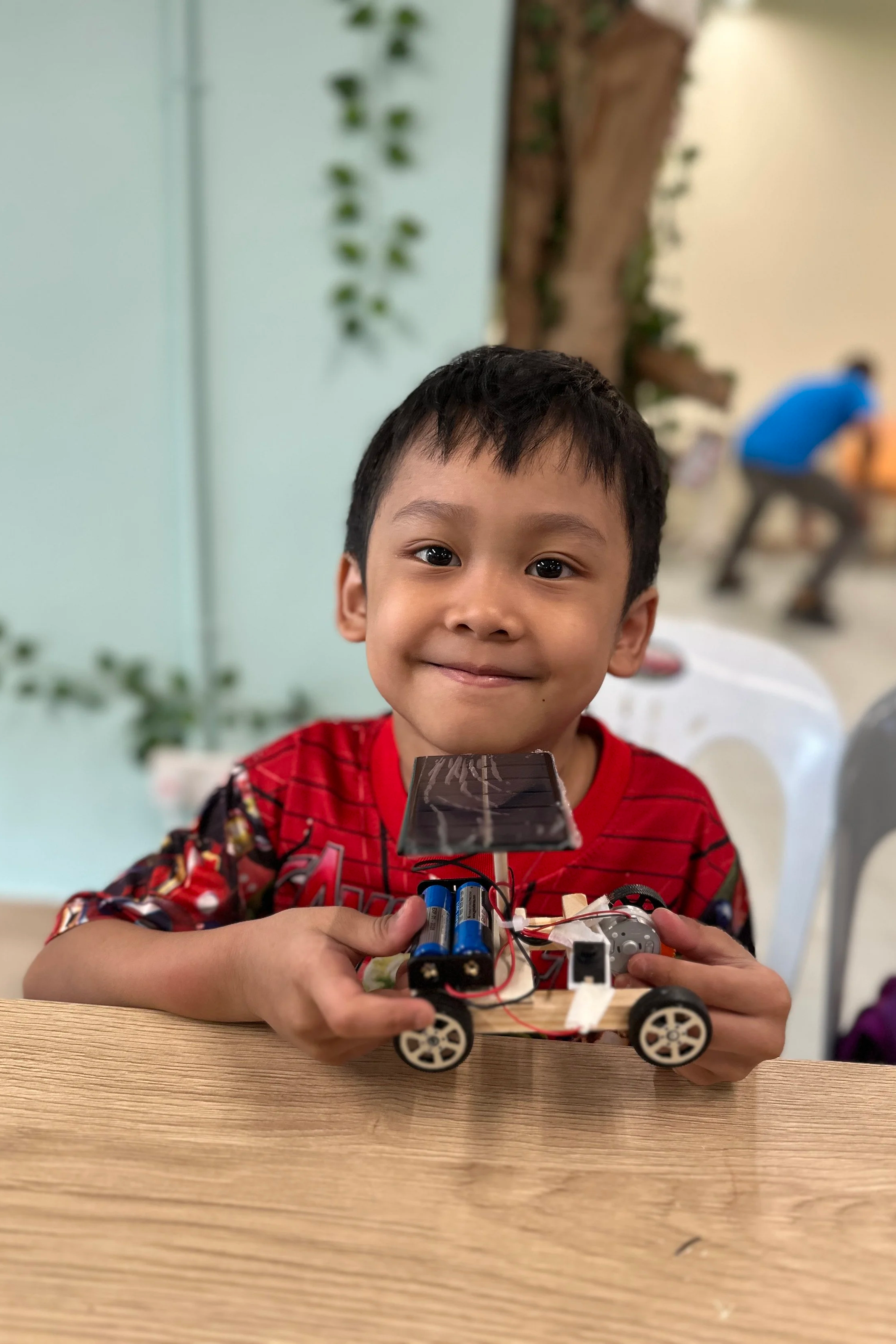 Handmade creative STEM craft project created by students during a maker workshop