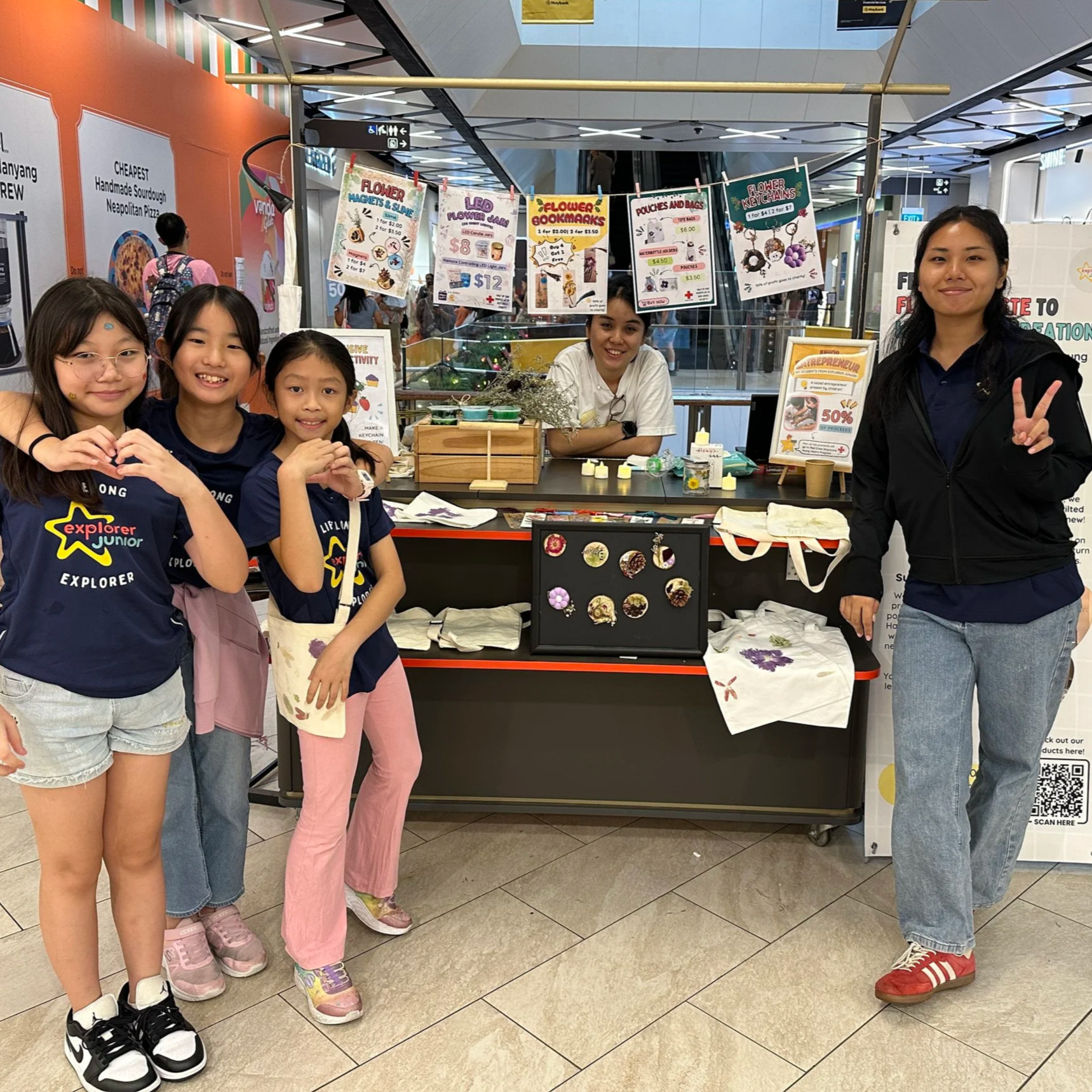 Students presenting and selling products they designed during a STEM entrepreneurship project