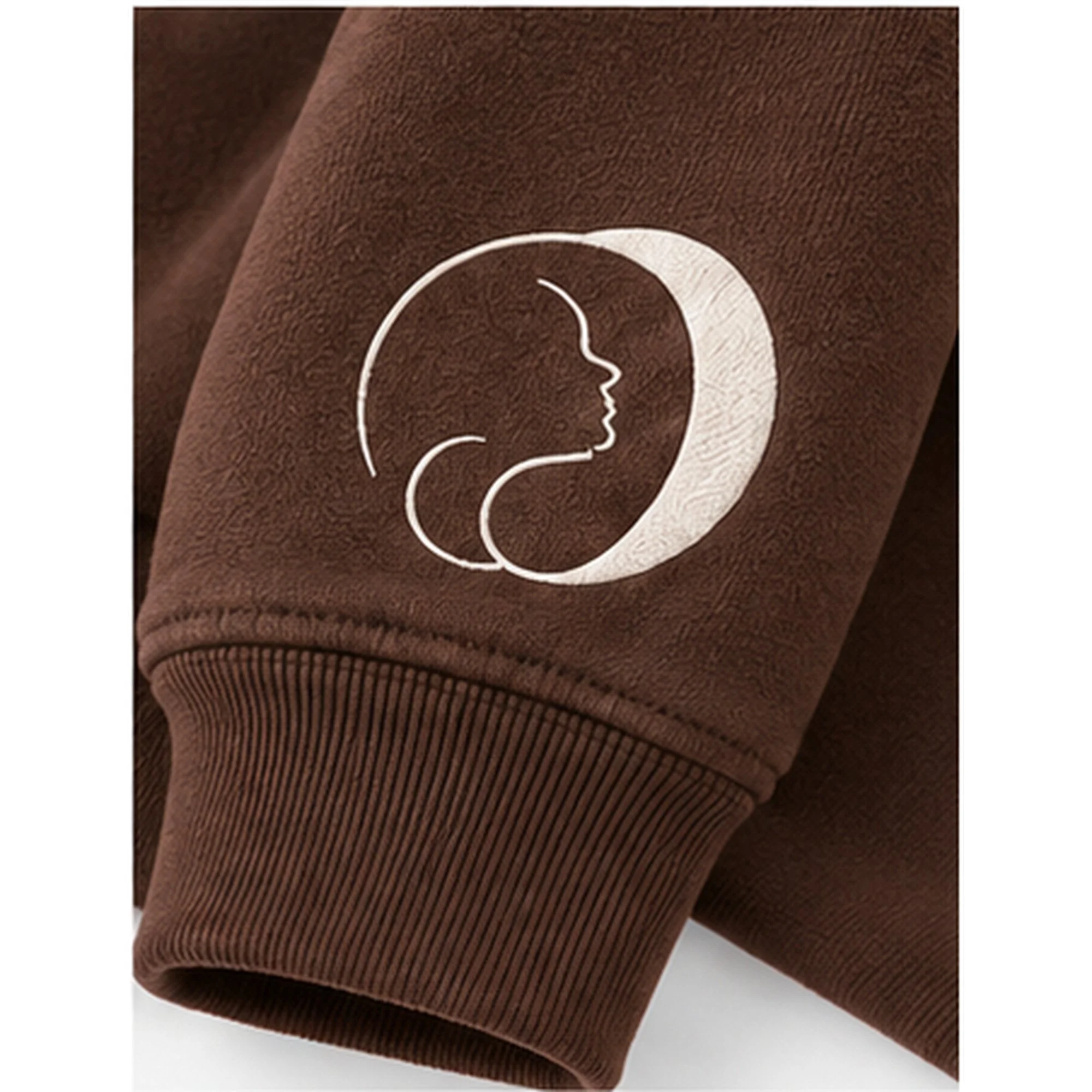 Unmask_Brown_Hoodie_Sleeve_Logo_Detail_Squarespace_2000x2000.jpg