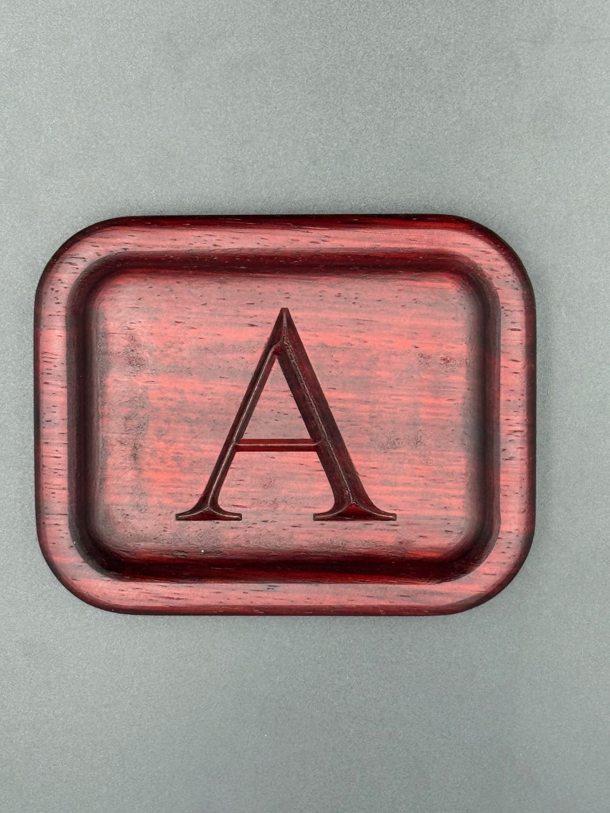 Small Valet Tray with the initial A v-carved on the bottom. Carved on Padauk.