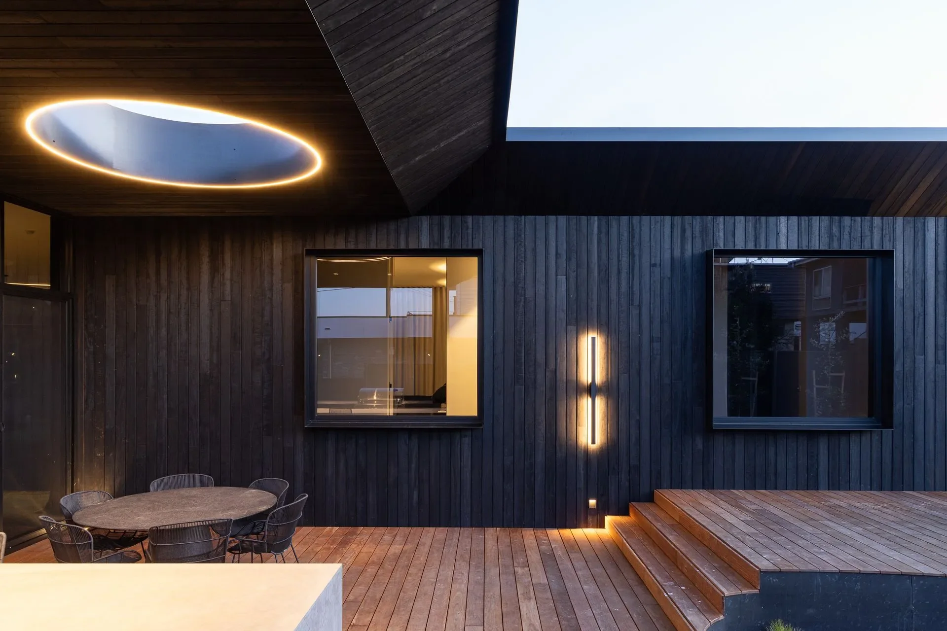 Entertainers dream with stunning deck and impressive lighting. Charred timber cladding by Eco Timber Group