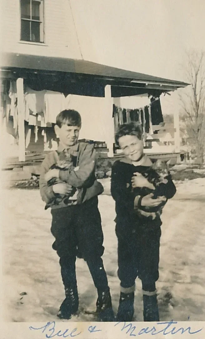 Vintage 1926 black and white photo of Martin and Bill Fortier, part of the deep-rooted history of The Farmstand property.