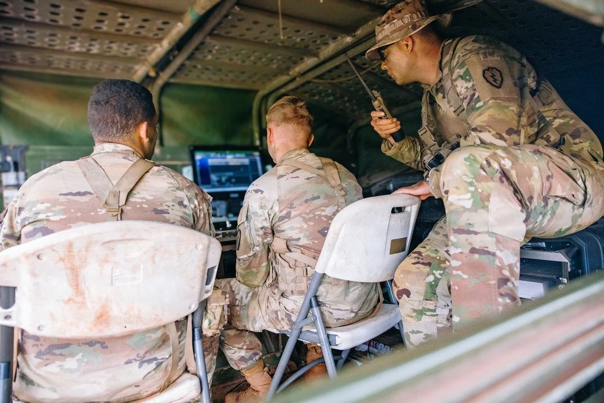 25th Infantry Division soldiers receive a fire mission in a battalion fire direction center during Lightning Surge 2.