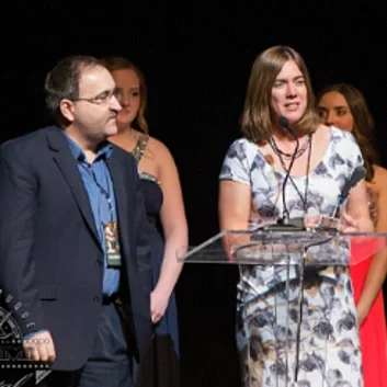 Clark Kidder and Colleen Bradford Krantz, who together wrote and produced West by Orphan Train, receiving an award at the Julien Dubuque Film Festival.
