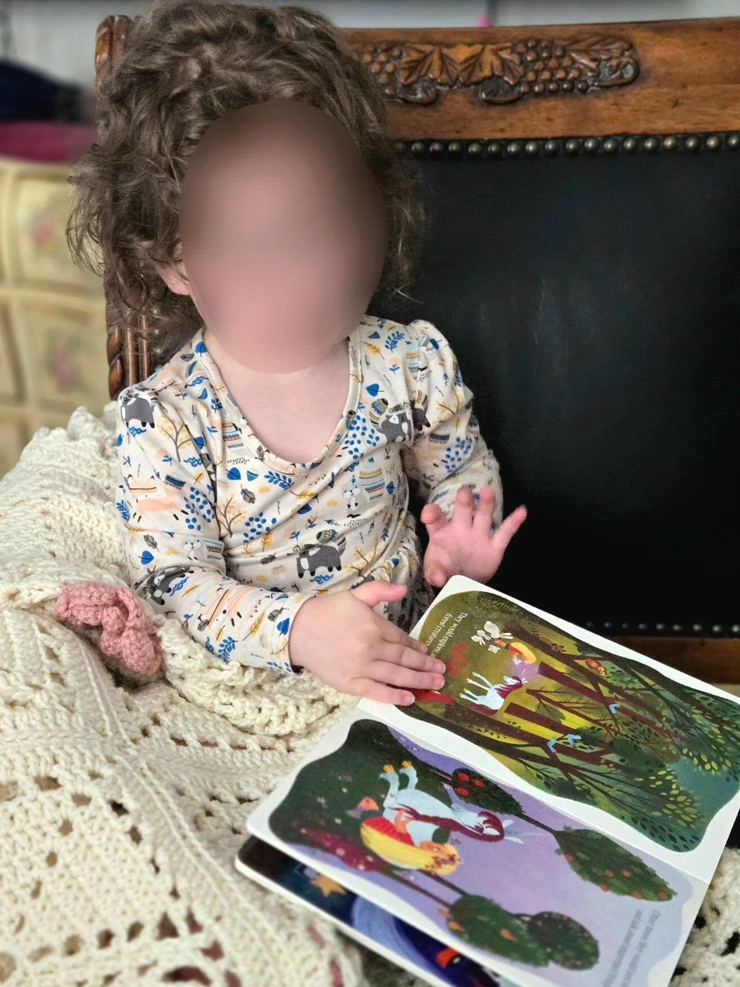 Motherhood has changed the way I read.

These days, stories are not always quiet.
Sometimes they come with tiny hands turning pages too quickly, blanket nests, interrupted sentences, and a little voice who has become very skilled at negotiating &ldqu