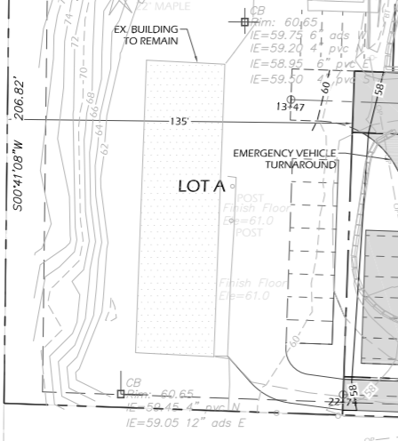 A site plan map showing lot A, with labels for an existing building to remain, an emergency vehicle turnaround, and electrical and utility notes. The map includes contour lines, boundary measurements, and elevation details.